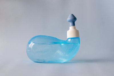 neti pot filled with a saline solution